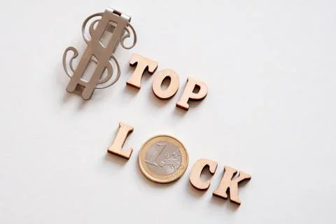 The phrase STOP LOCK composed of usa dollar symbol, coin of one Euro and wood Stock Photos