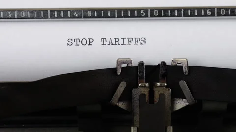 The phrase STOP TARIFFS is typing on a retro typewriter. Stock-Footage 314581813