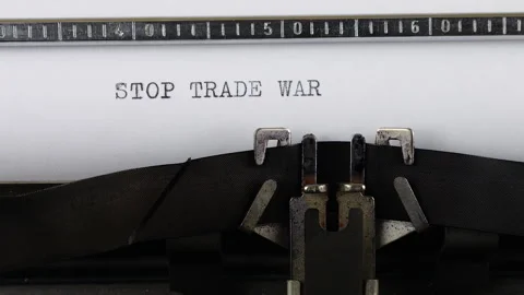 The phrase STOP TRADE WAR is typing on a retro typewriter. Stock Footage 314583466