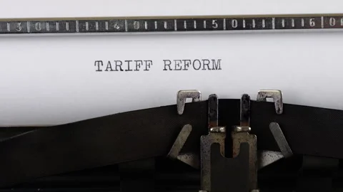 The phrase TARIFF REFORM is typing on a retro typewriter. Video stock 314583170