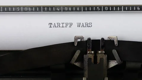 The phrase TARIFF WARS is typing on a retro typewriter. Stock Footage 314580840