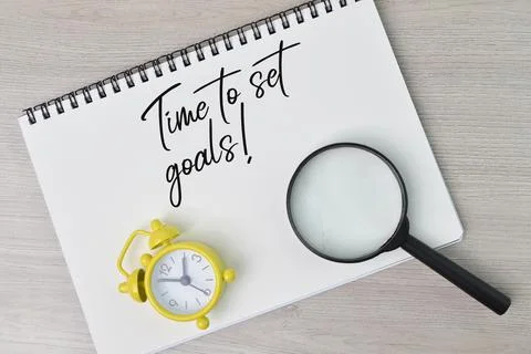 Phrase TIME TO SET GOALS written on notebook. Conceptual image. Stock Photos