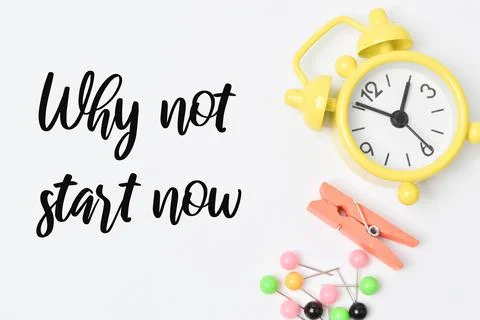 Phrase WHY NOT START NOW written on white background with clock, clothespin a Stock Photos