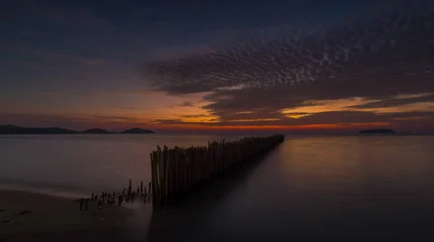 Phuket beach bamboo old pier sunset panorama 4k time lapse thailand Stock Footage 61869052