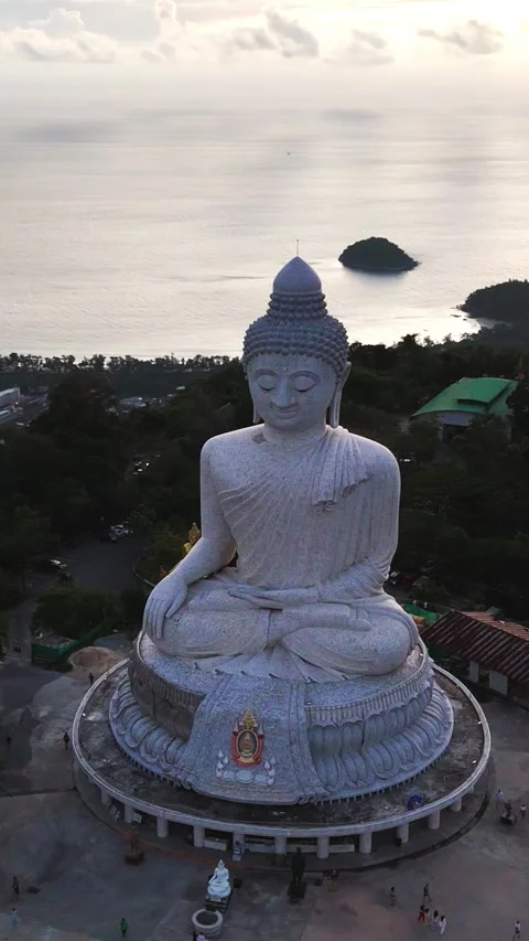 The Phuket Big Buddha marble statue during sunset. Aerial vertical Vidéo 334707576