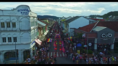 Phuket City Pride Celebration with Rainbow Decorations and Festival Crowd Stock Footage 337961735