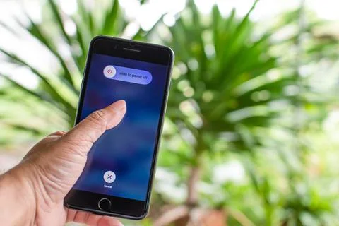 Phuket, Phi Phi, Thailand Oct 8, 2020: Hand holding Apple iPhone 7 plus in .. Stock Photos