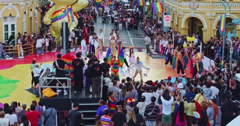 Phuket Pride Parade with Rainbow Flags and Festive Atmosphere Stock-Footage 338124623