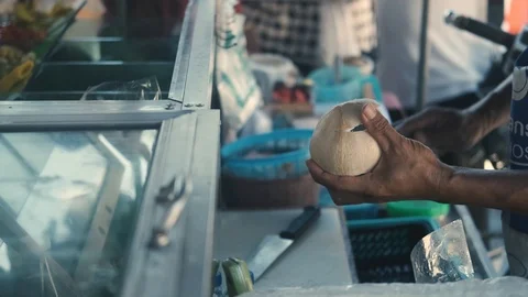 Phuket stall making Coconut Drink for tourist in Thailand Stock Footage