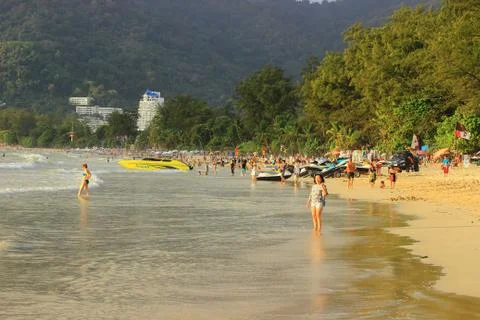 Phuket, Thailand - August 02, 2017. sandy beach with tourists Stock Photos
