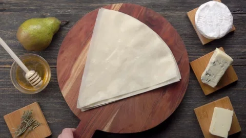 Phyllo Dough Board with Pear Pie Ingredients on Table Stock Footage 311935065
