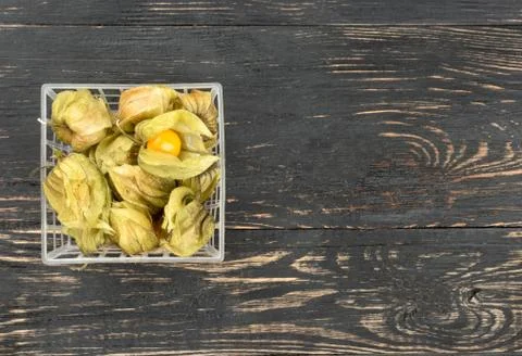 Physalis berries in a container Stock Photos