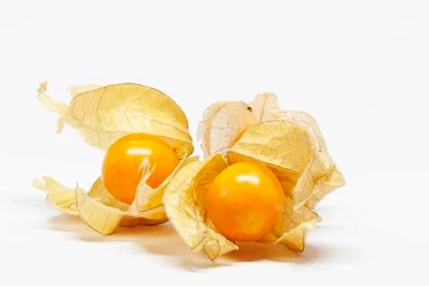 Physalis fruit with peel on white background Stock Photos
