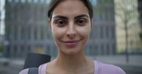 Physical activity and wellbeing concept. Glad smiling woman restores strength Stock Footage 160204399