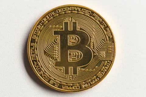 Physical bitcoin on a white background Stock Photos