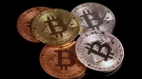 Physical Bitcoins falling slow motion Stock Footage 83351674