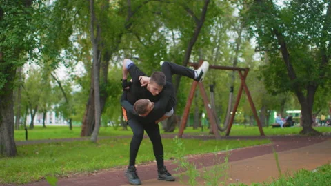 Physical confrontation observed with safety demonstration, Individuals compete Stock Footage 325032168