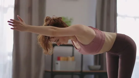 Physical exercise for good feeling and healthy, woman is doing workout at home Stock Footage 151643568