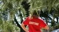 Physical exercise in a park with instructor HD Footage