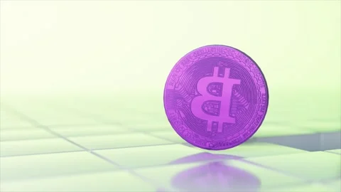 Physical purple bitcoin spinning on a reflective tiled surface representing the Stock Footage 334043192