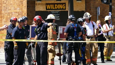 Physical rescue firemen Stock Footage 115934884