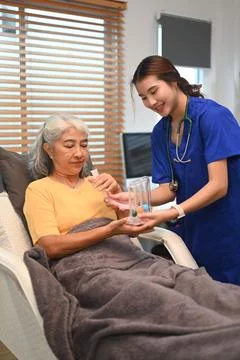 Physical therapist using Incentive Spirometer or Triflow to help patients to Stock Photos