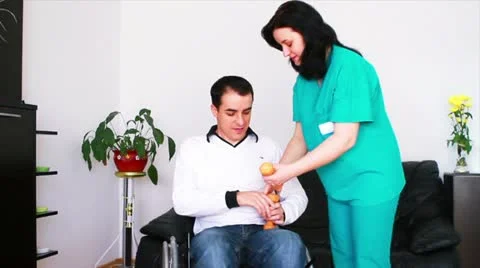 Physical therapist working with patient Stock Footage 22024959