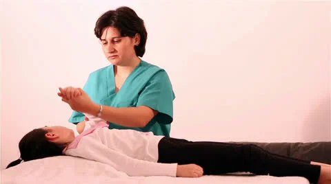 Physical Therapy at hand to a child Stock Footage 24671172