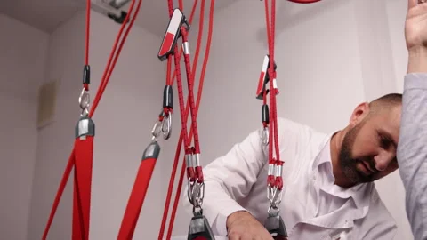 Physical therapy practitioner, Physical manipulation, Patient rehabilitation Stock Footage 296894140