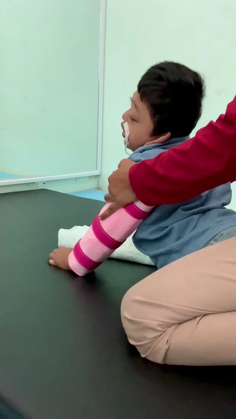 Physical Therapy Session for Child with Cerebral Palsy Stock Footage 339566708