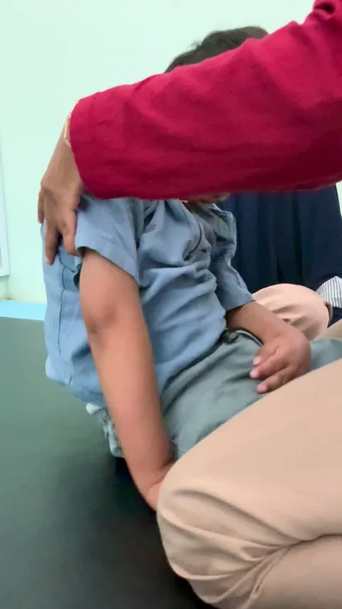 Physical Therapy Session for Child with Motor Impairment Stock Footage 339566893