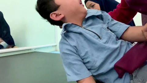 Physical Therapy Session for Child with Motor Impairment Stock Footage 339566911