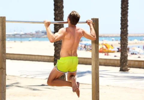 Physical training pull up workout Stock Photos