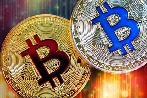 Physical version of Bitcoin (new virtual money) with colorful effect Physi... Stock-Fotos