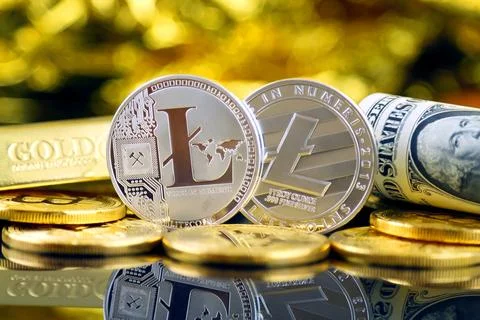 Physical version of Litecoin (new virtual money) and banknotes of one dolla.. Stock Photos