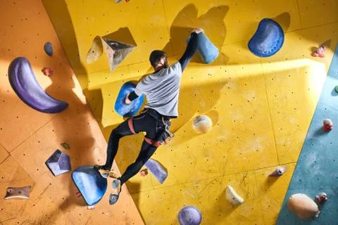 Physically challenged boulderer enjoys his extreme hobby, lives active life Stock Photos