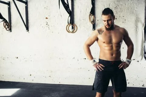 Physically Fit Man posing In A Health Club Stock Photos
