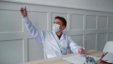 The physician assistant studies received a blood test for the presence of virus Stock Footage 126750899