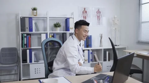 Physician is cheering and moving back Stock Footage 150812259