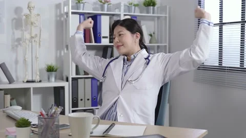 Physician finishing work on the computer Stock Footage 149075754