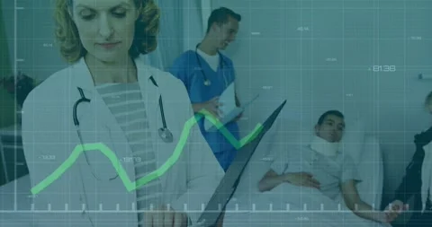 Physician operating tablet, nurse writing notes, moving green chart causing Stock Footage 331214639