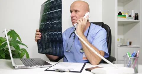 Physician Phone Talking Examine X-Ray Image Not Satisfied Bad Cure Results Stock-Footage 59374047