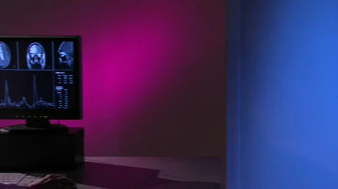 Physician points to 3 brain scans Stock Footage 459112