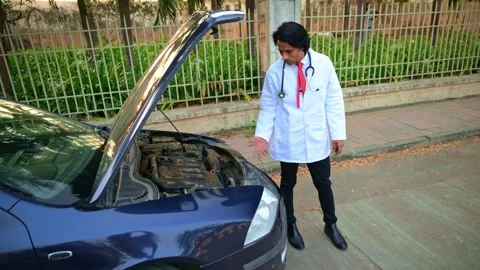 Physician standing next to car Stock Footage 278022814