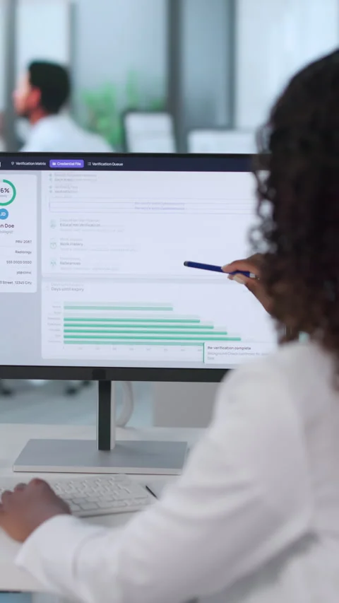 Physician Using Medical Software To Verify Credentials Stock Footage 339912785