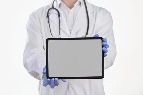 Physician's showing an app on a tablet screen Stock Photos