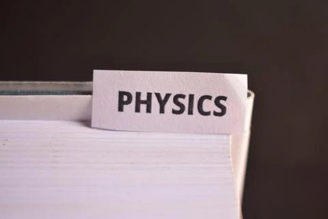 Physics Bookmark Inserted in Book Representing Science, Research and Educatio Stock Photos
