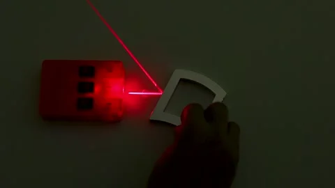 Physics Optics Experiment with Red Laser Beam and Curved Mirror Stock Footage 347110334