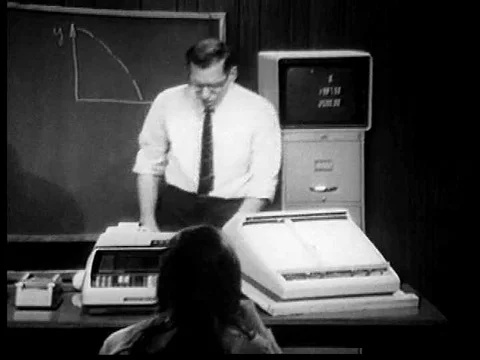 A physics teacher diagrams a problem on the blackboard, uses his data outcome, 動画素材 75288091