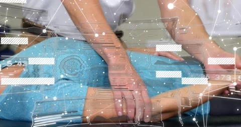 Physio therapist adjusting towel under neck, sliding hands down arm, boosting Stock Footage 317834216